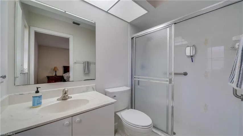 Primary bathroom has a walk-in shower.