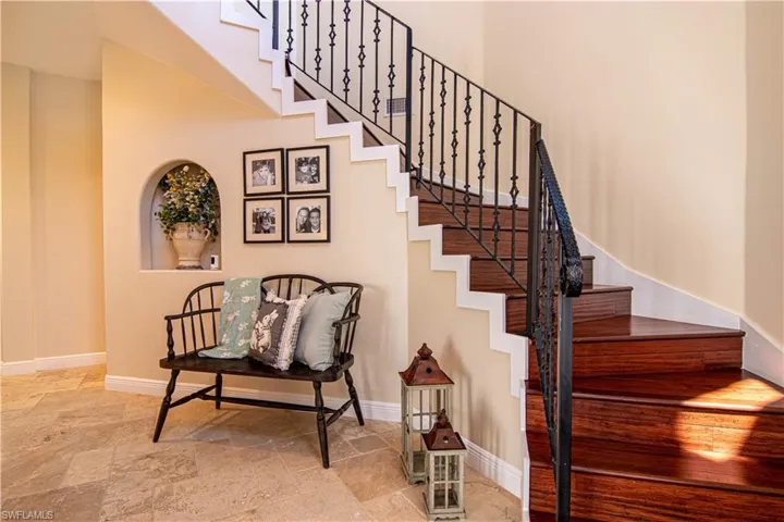 Elegant winding staircase leads to the second floor.