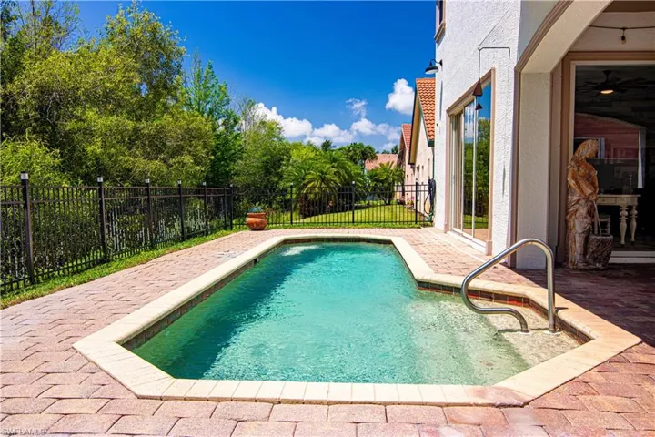 This Florida Lifestyle includes a beautiful private pool surrounded by nature and lots of sunshine!