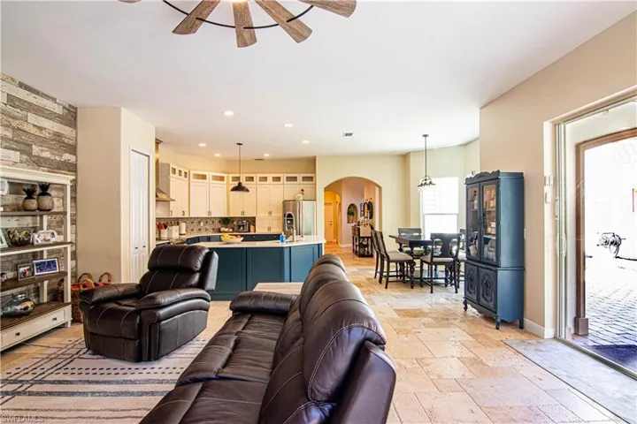 View from the open main living area to the front entry hallway.