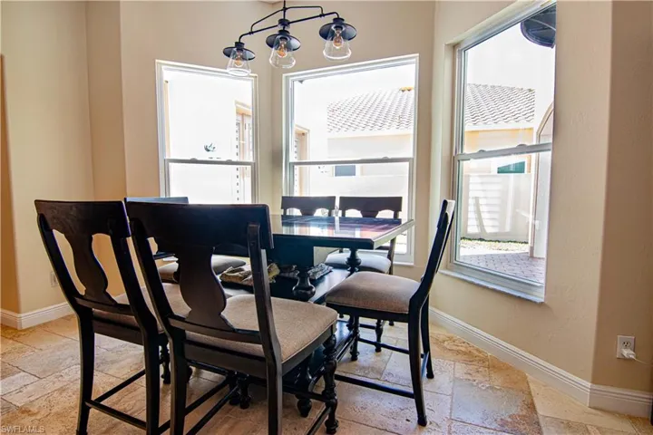 Dining area looks out onto the beautiful courtyard.