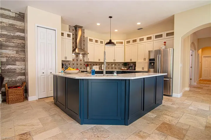 Remodeled kitchen features newer stainless appliances, granite counters and soft close cabinetry.