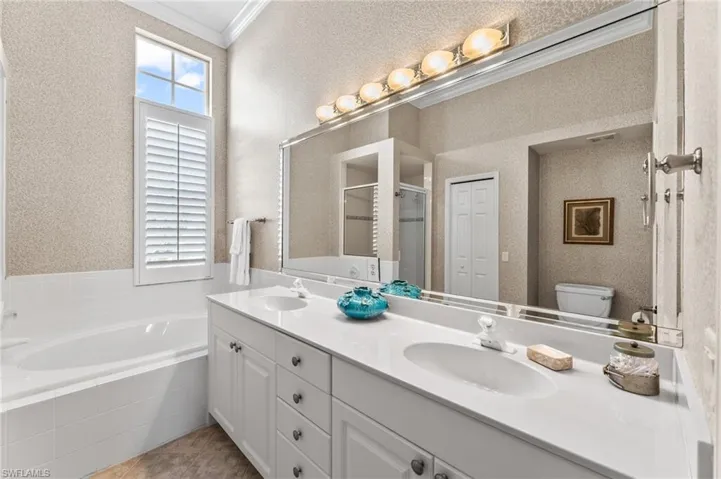 Bright and cheerful primary bathroom