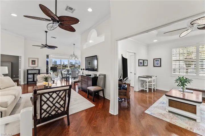 Walk inside to experience open living space, with beautiful wood floors, vaulted ceilings and tons of natural light