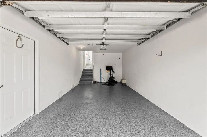Extra deep garage with a classic epoxy floor finish