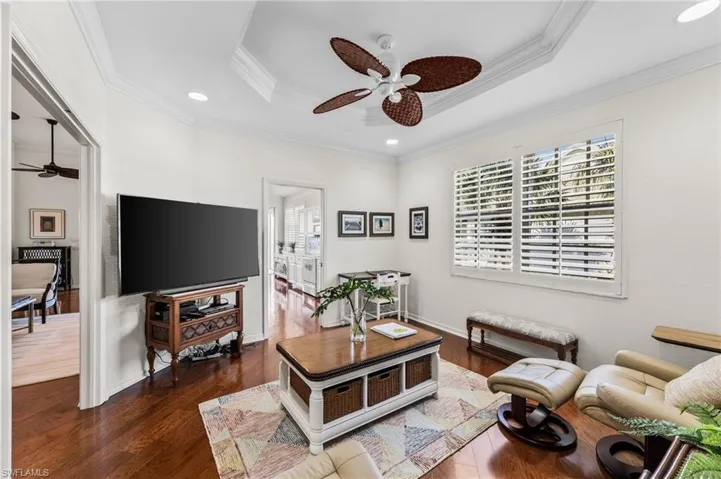 Den/Study offers a pocket door leading to the kitchen.