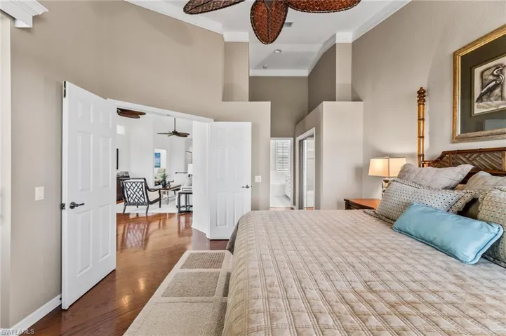 French Doors and vaulted ceilings give an elevated feeling of elegance in your primary bedroom.
