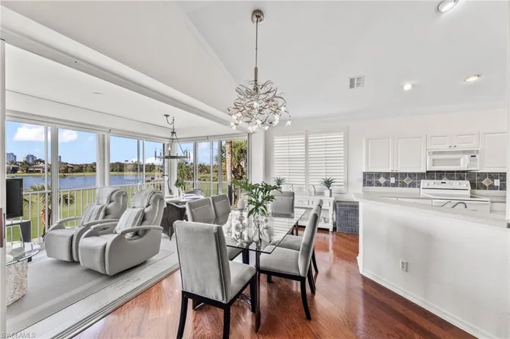 Thoughtful placement of the dining area, with a striking chandelier.