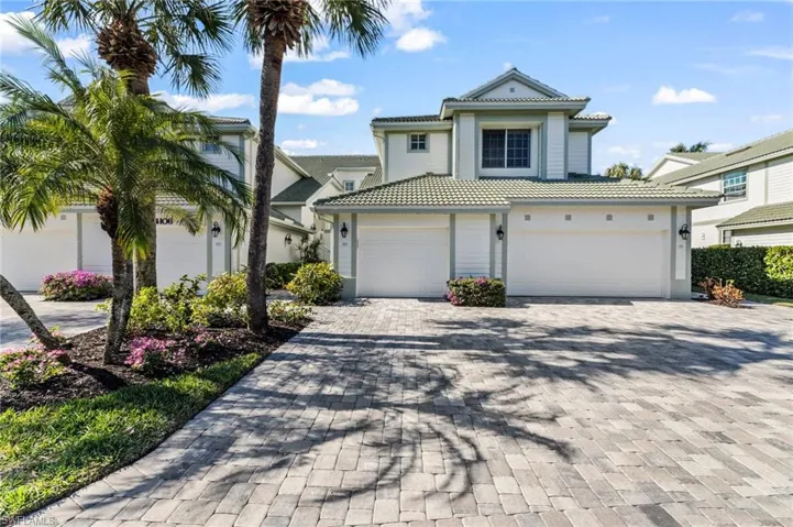 Attractive curb appeal with an inviting paver driveway