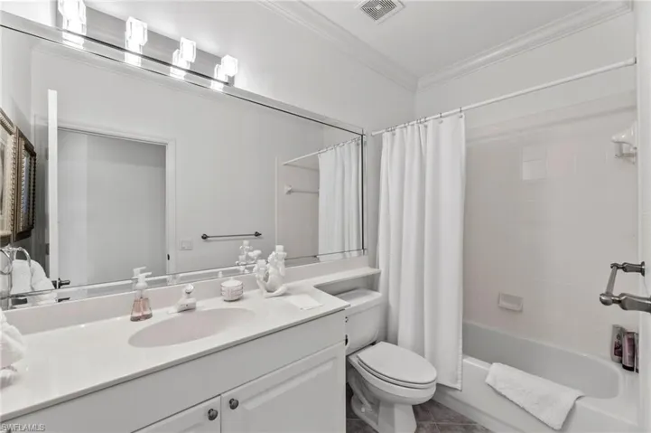 Guest Bathroom offers a convenient shower tub combo, to accommodate your guests needs.