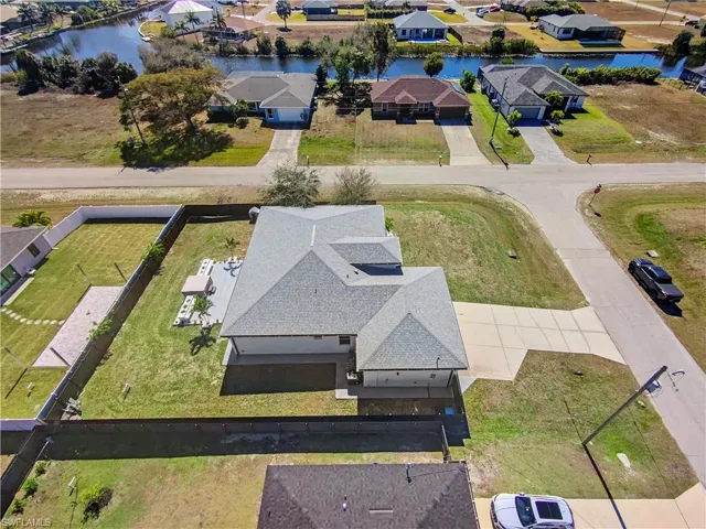 Aerial view of residential area with a nearby body of water