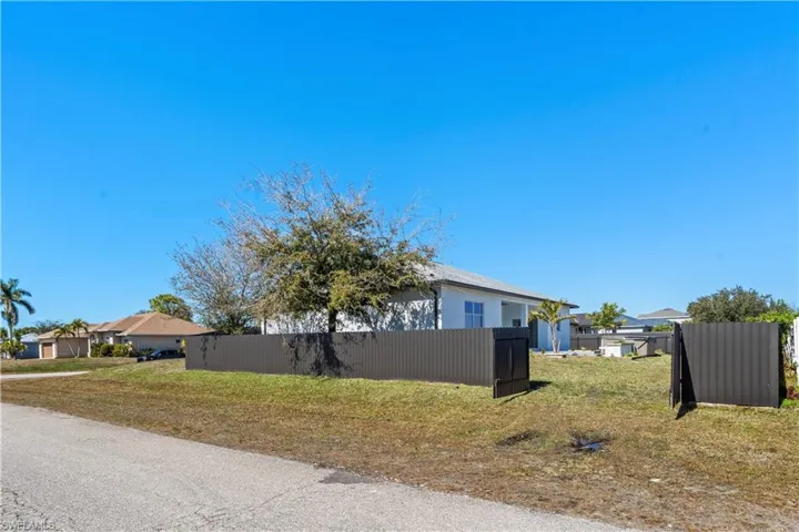 View of side of home with a residential view