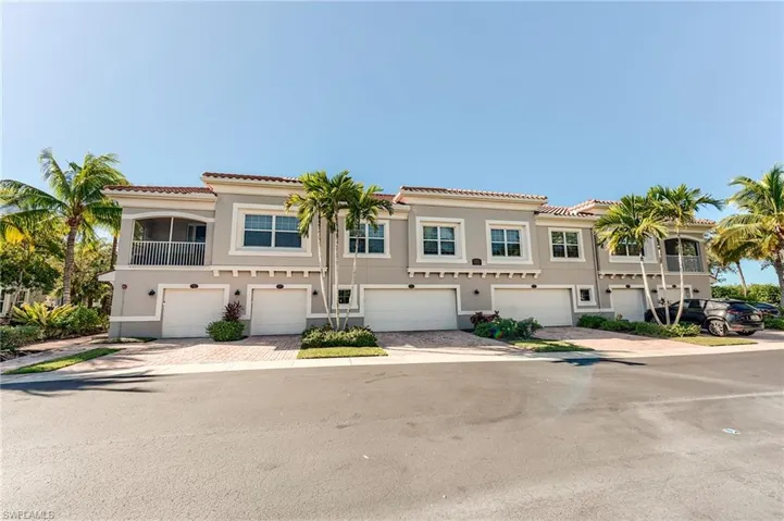 Mediterranean / spanish-style home featuring stucco siding, a tile roof, and a balcony