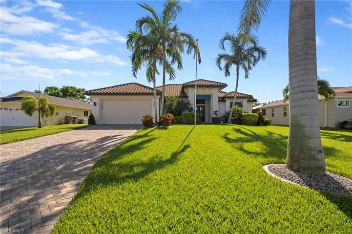 Front Yard and Paver Driveway