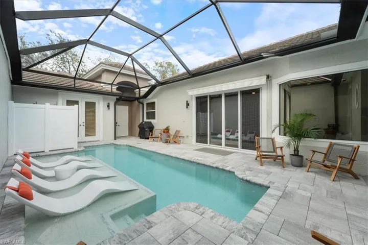 Outdoor pool with a patio area