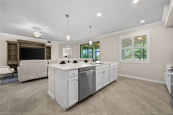 The Kitchen features a Quartz Island with Breakfast Bar