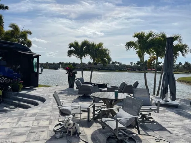 View of patio with a water view