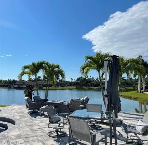 View of patio / terrace with a water view