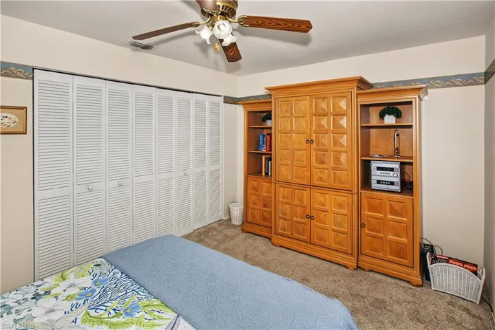 Wood-finish ceiling fan with integrated lighting