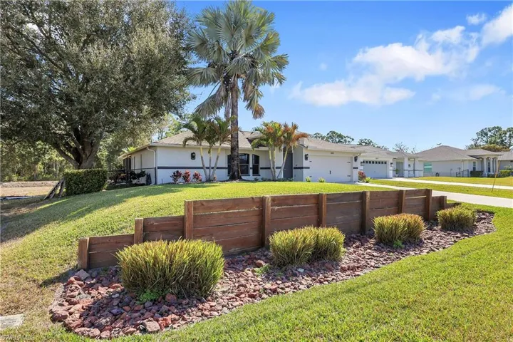 View of yard featuring a garage