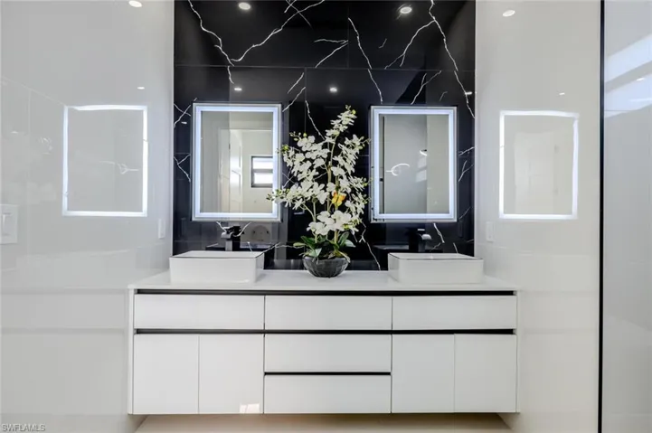 Full bathroom featuring double vanity