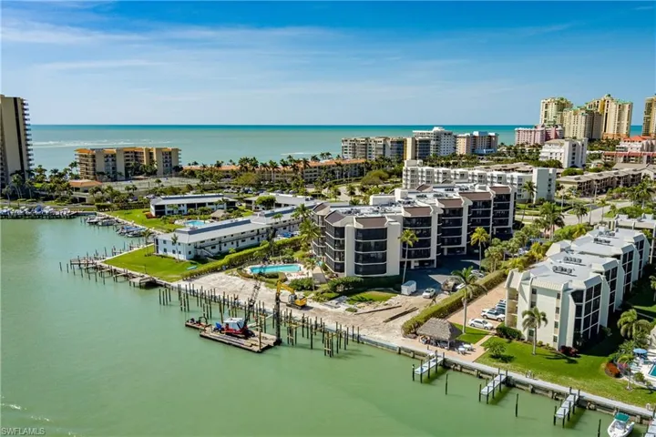 Bird's eye view with a city view and a water view