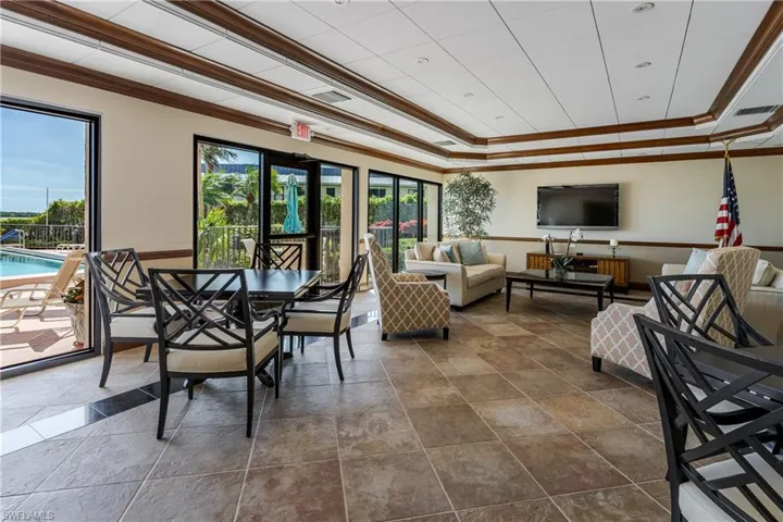 Dining room featuring crown molding and a tray ceiling