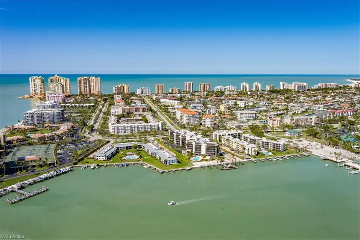 Aerial view with a view of city and a water view