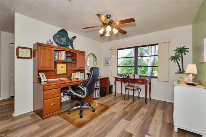 This room can be used as a home office, den or dining room.  Sellers chose to use as an office.