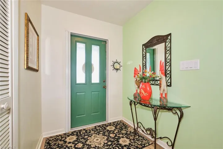 Upon entering 7 NE 12th Court you come into a small foyer complete with a little coat closet.