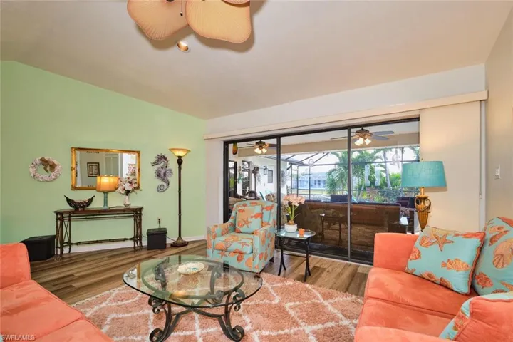 Here's a great photo of looking through the living room into the lanai.