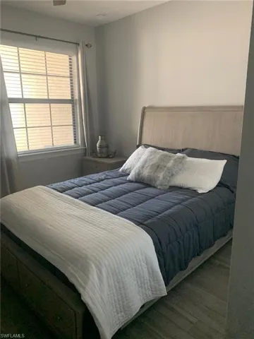 Bedroom featuring wood finished floors