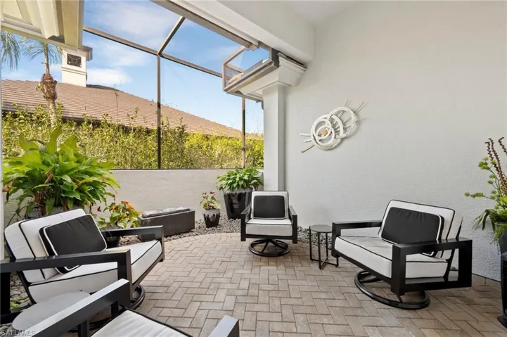 Screened patio off of kitchen
