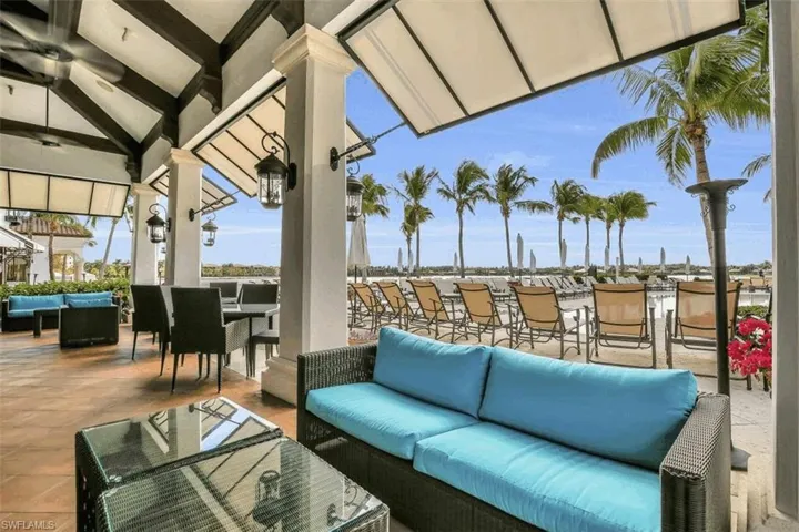View of patio / terrace with an outdoor living space, a ceiling fan, and outdoor dining space