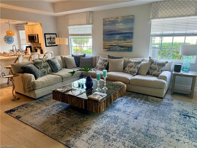 Living area with light wood-type flooring