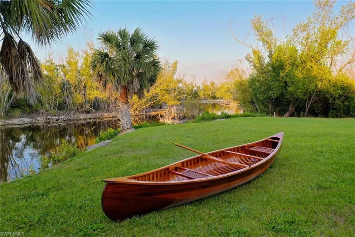 View of grassy yard featuring a water view