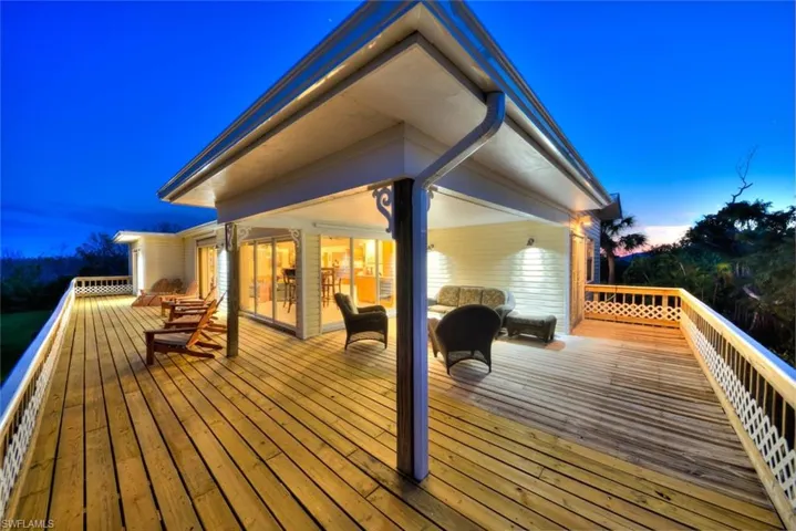 View of deck at dusk
