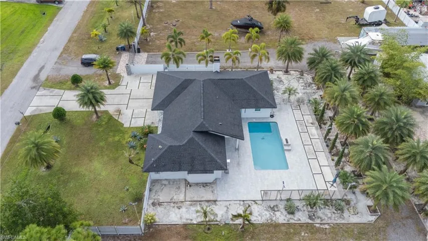 View from above of property featuring a pool area