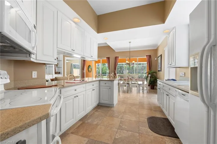 28311 Nautica Lane Bonita Springs FL 34135 - Kitchen view from pocket door in Den