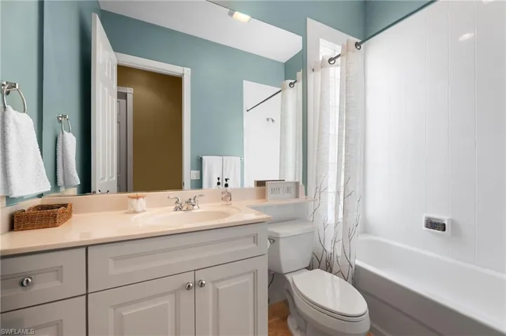 28311 Nautica Lane Bonita Springs FL 34135 - secondary bathroom with new elevated vanity and soft close drawers & doors