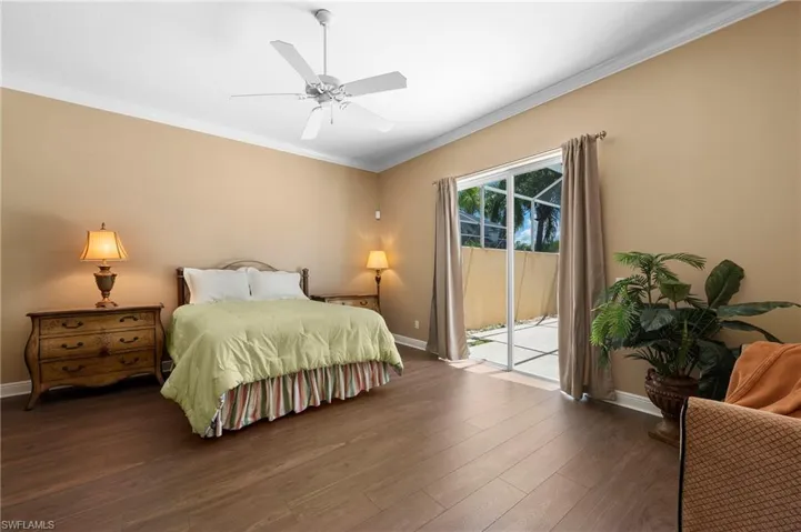 28311 Nautica Lane Bonita Springs FL 34135 - Owner's bedroom with wide plank luxury vinyl flooring