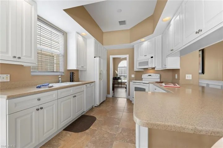 28311 Nautica Lane Bonita Springs FL 34135 - Kitchen with Corian countertops