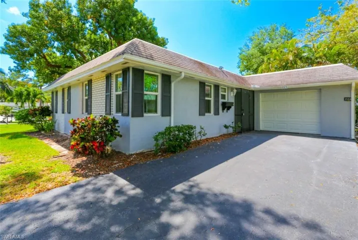 Ranch-style home with a garage
