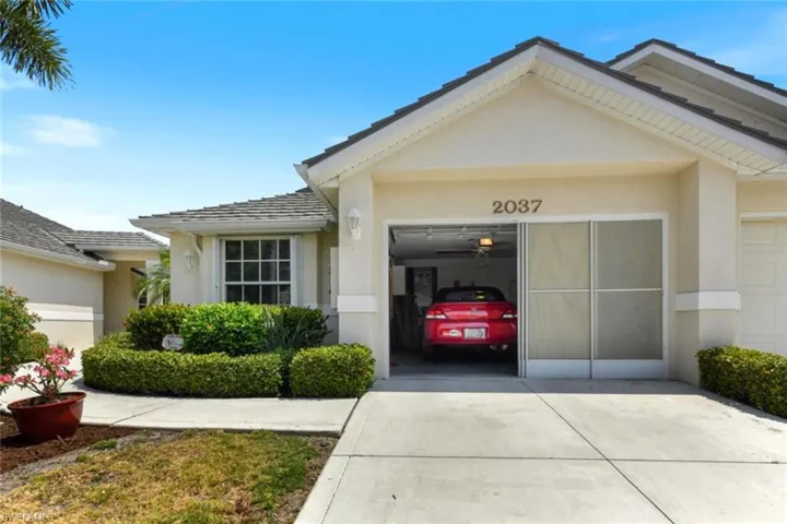 Property entrance with a garage