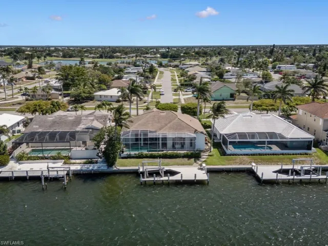 Aerial view with a water view and a residential view