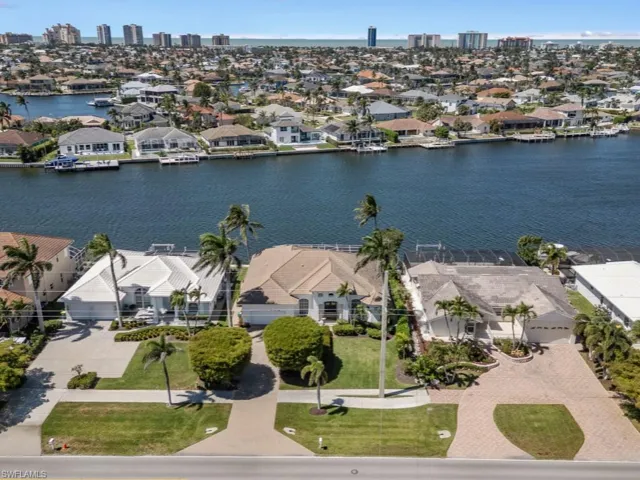 Bird's eye view featuring a water view and a residential view
