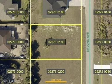 Aerial view of property's location featuring property parcel outlined