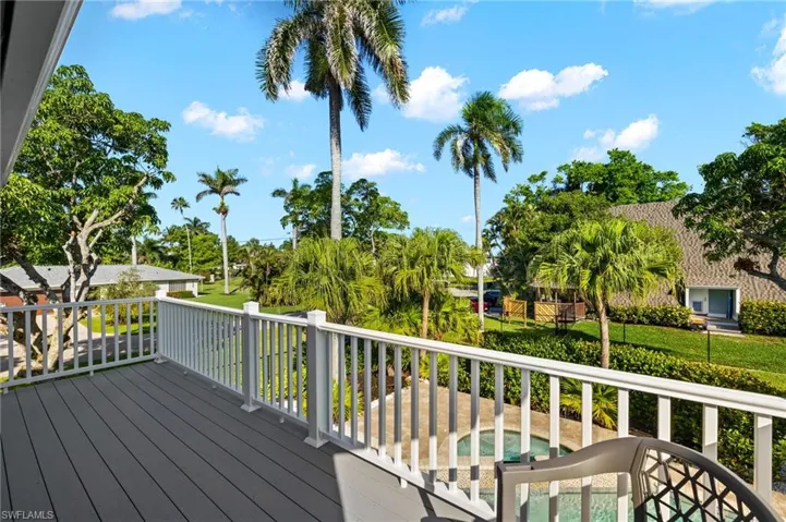 Primary bedroom balcony featuring a residential view