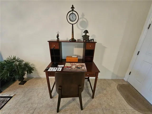 Dining area featuring light tile patterned floors