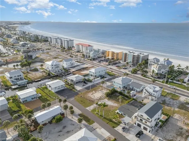 Sidewalk next to Island Towers is the beach access